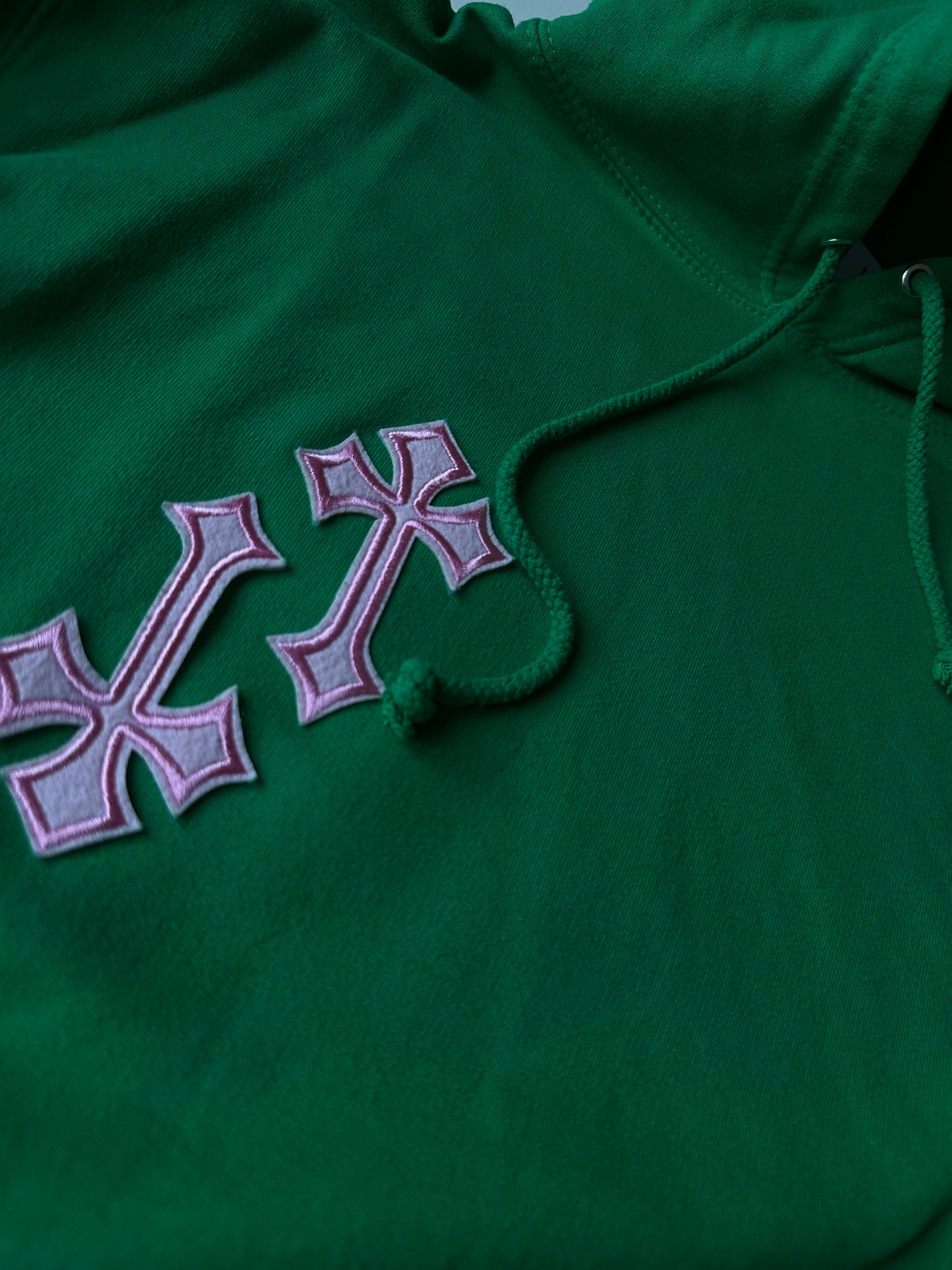 ‘CROSSED OUT’ HOODIE- GREEN & PINK