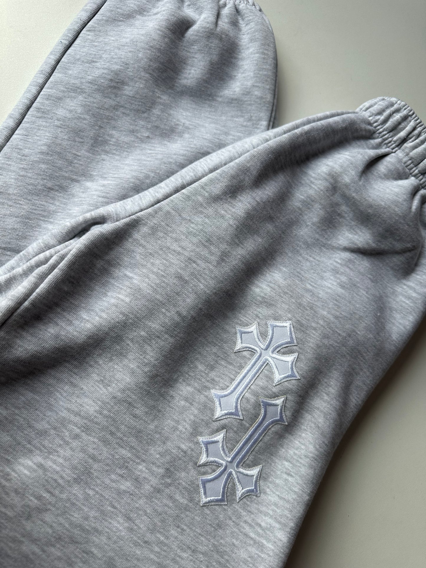 ‘CROSSED OUT’ JOGGERS- GREY